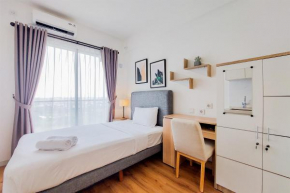 Warm and Simply Studio Apartment at Sky House BSD By Travelio